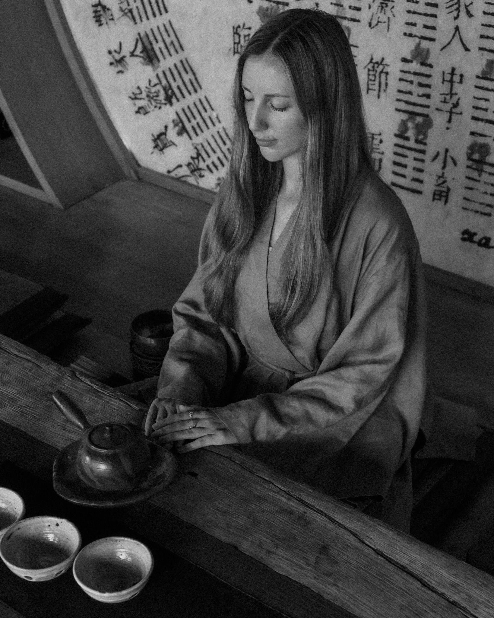 Tiyana Ti seated in daily tea practice