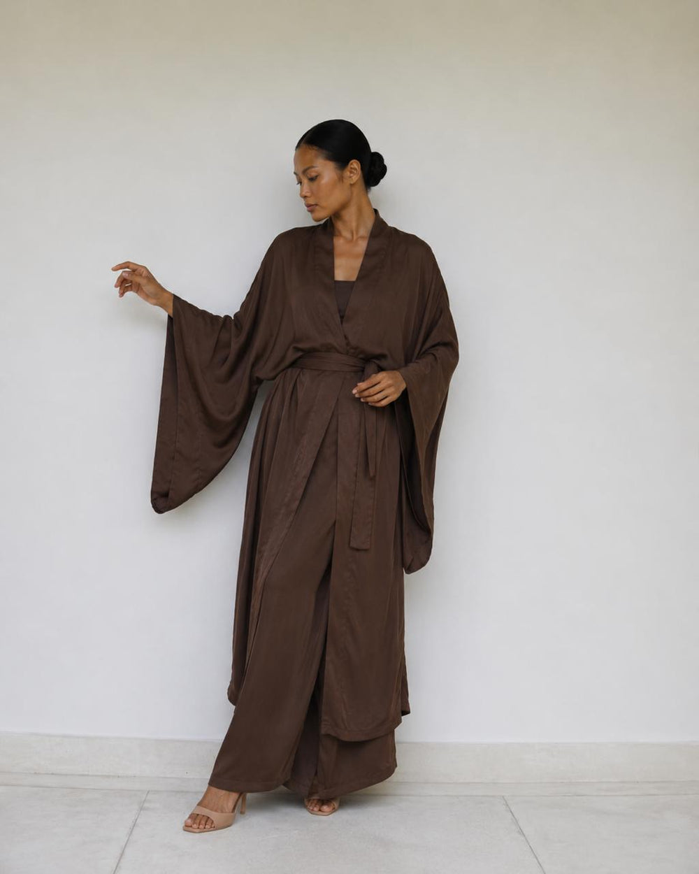 Aset Kimono in Earth Cacao, relaxed three-quarter front view