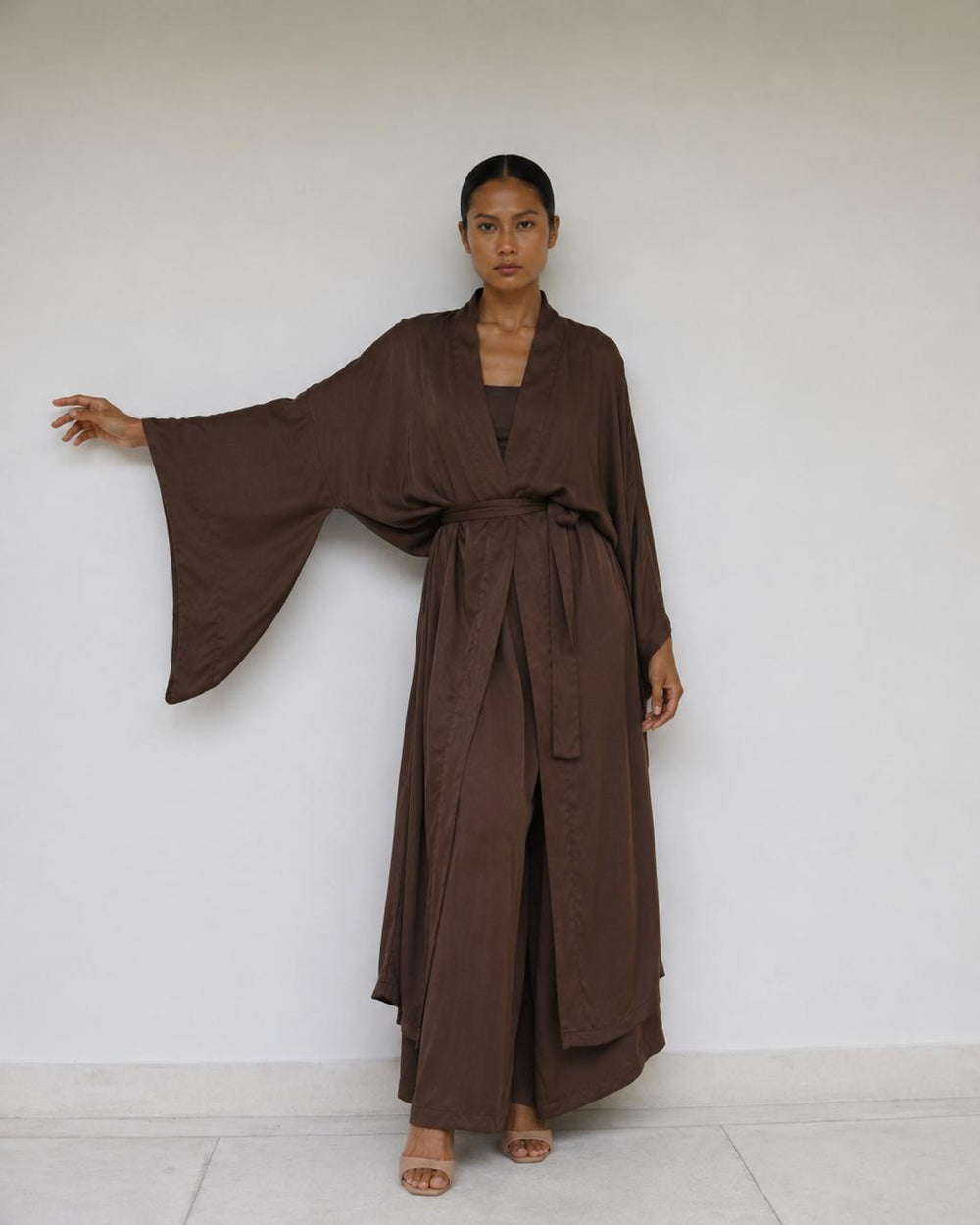 Aset Kimono in Earth Cacao, front view with one sleeve extended